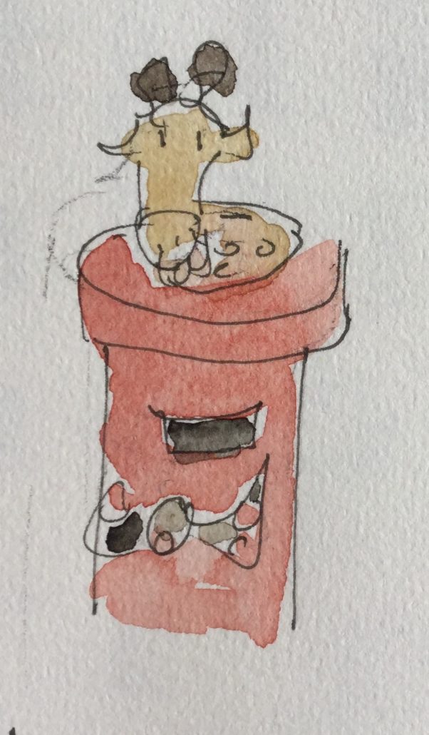 Mr G sitting on postbox